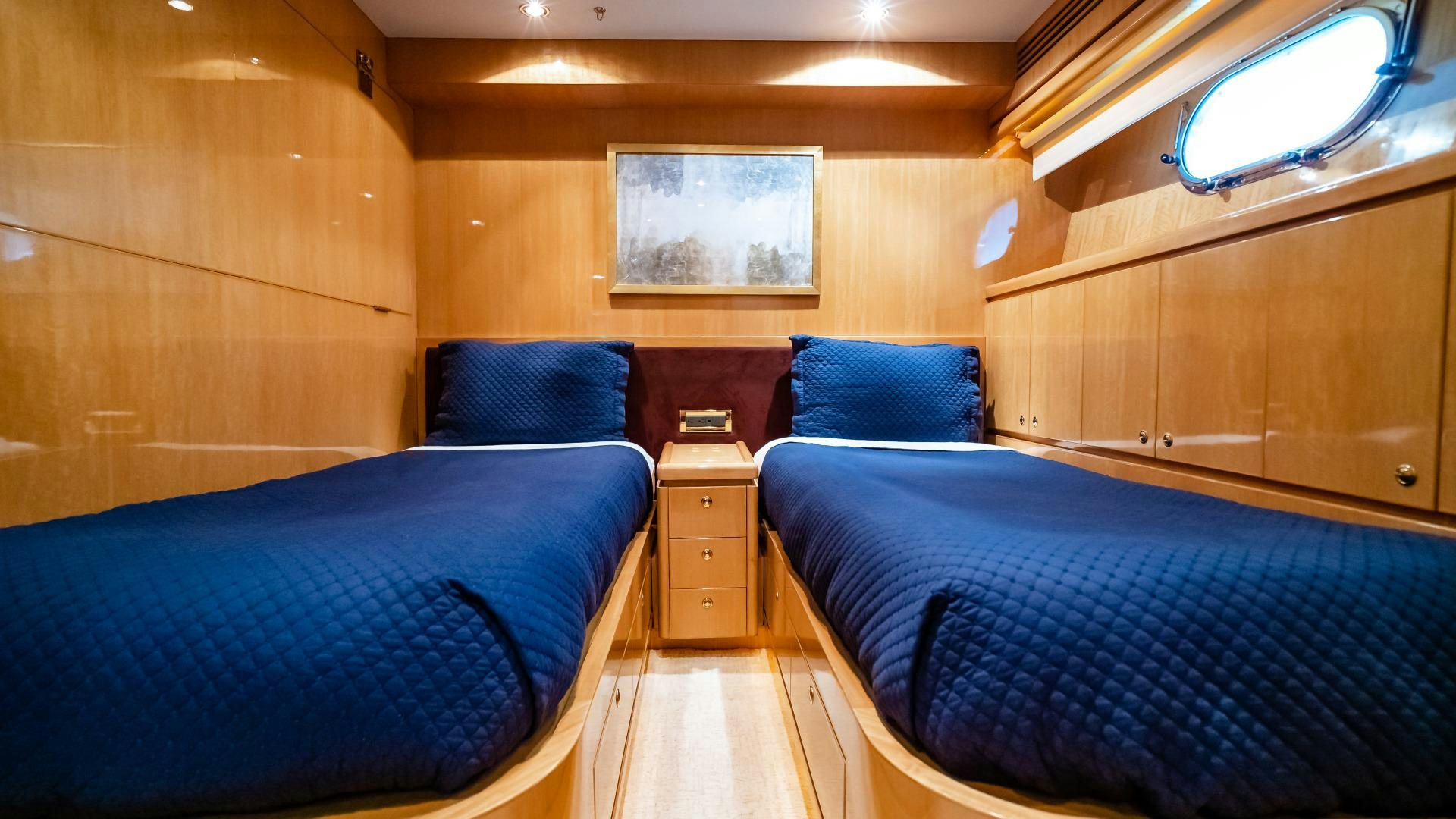 a room with two beds aboard VITESSE Yacht for Sale