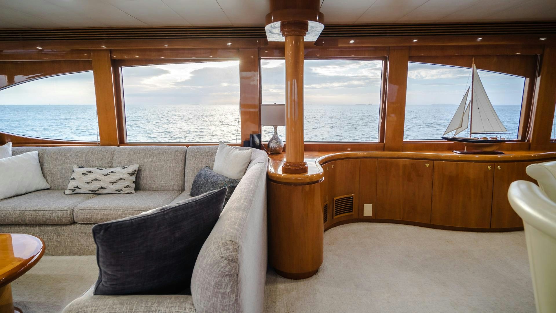 a living room with a large window aboard VITESSE Yacht for Sale