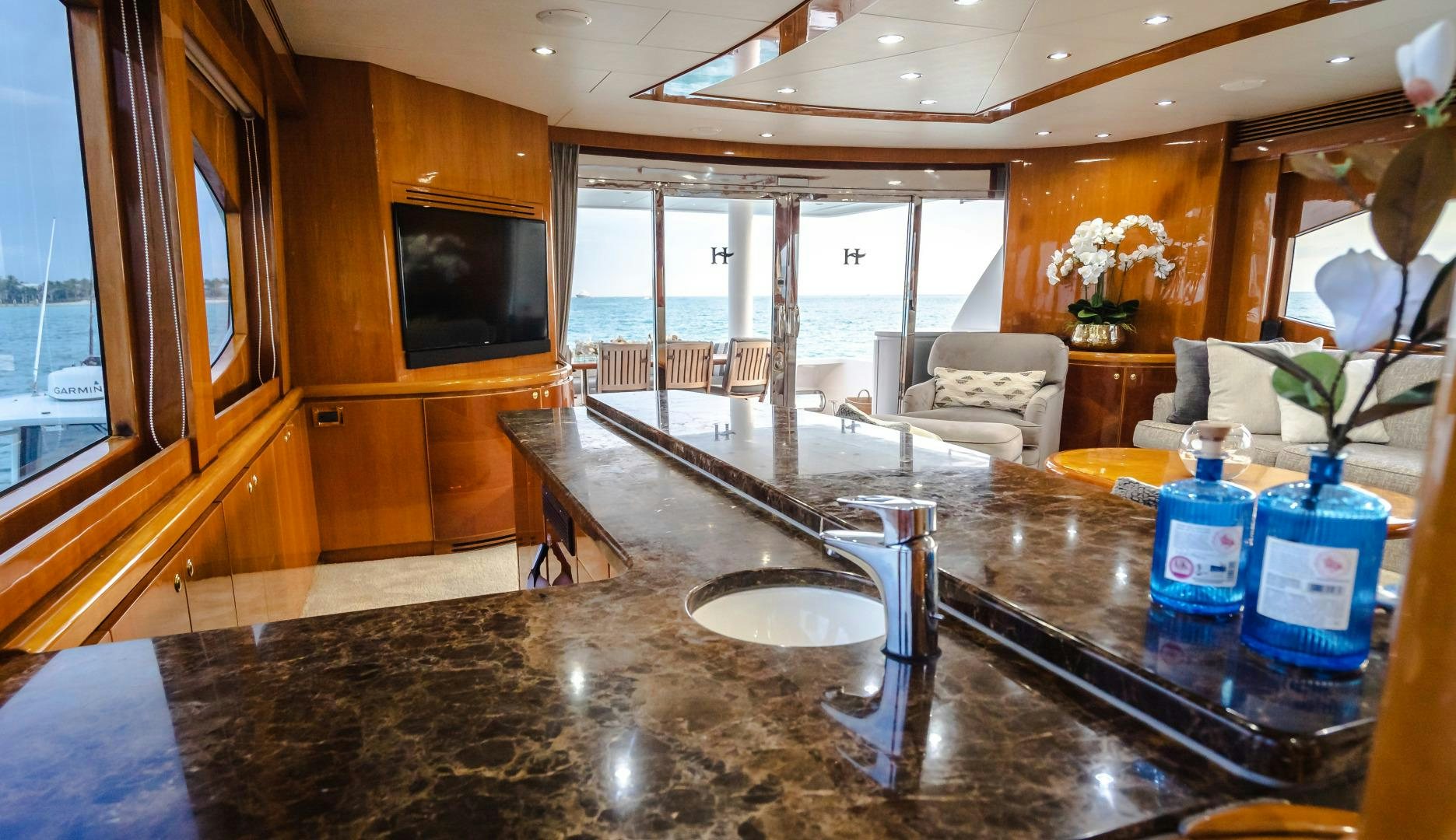 a large kitchen with a large island aboard VITESSE Yacht for Sale