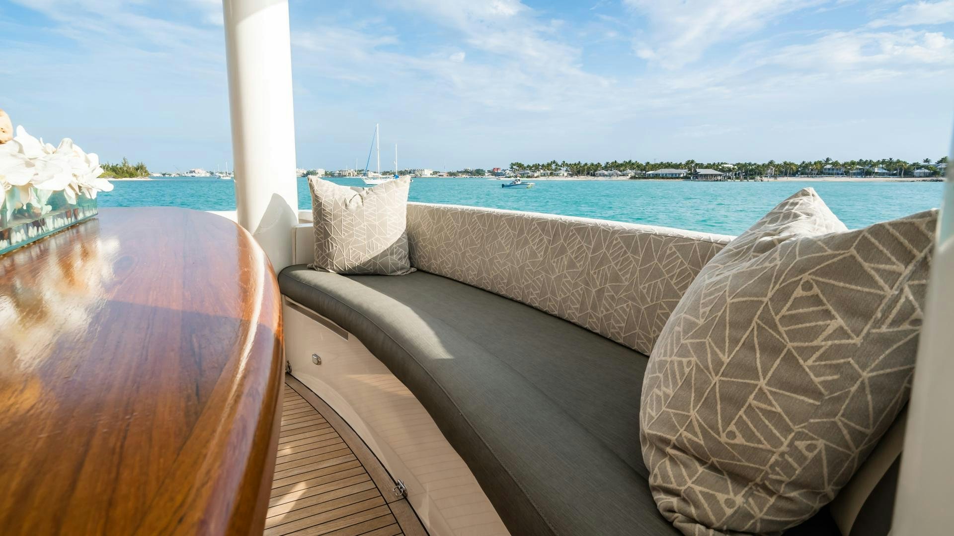 a bed with pillows on it aboard VITESSE Yacht for Sale