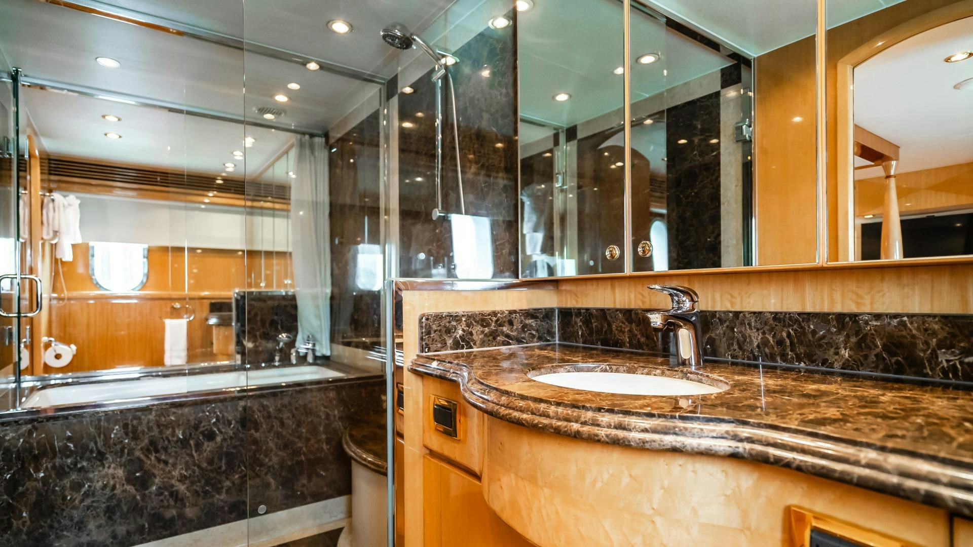 a bathroom with a marble countertop aboard VITESSE Yacht for Sale