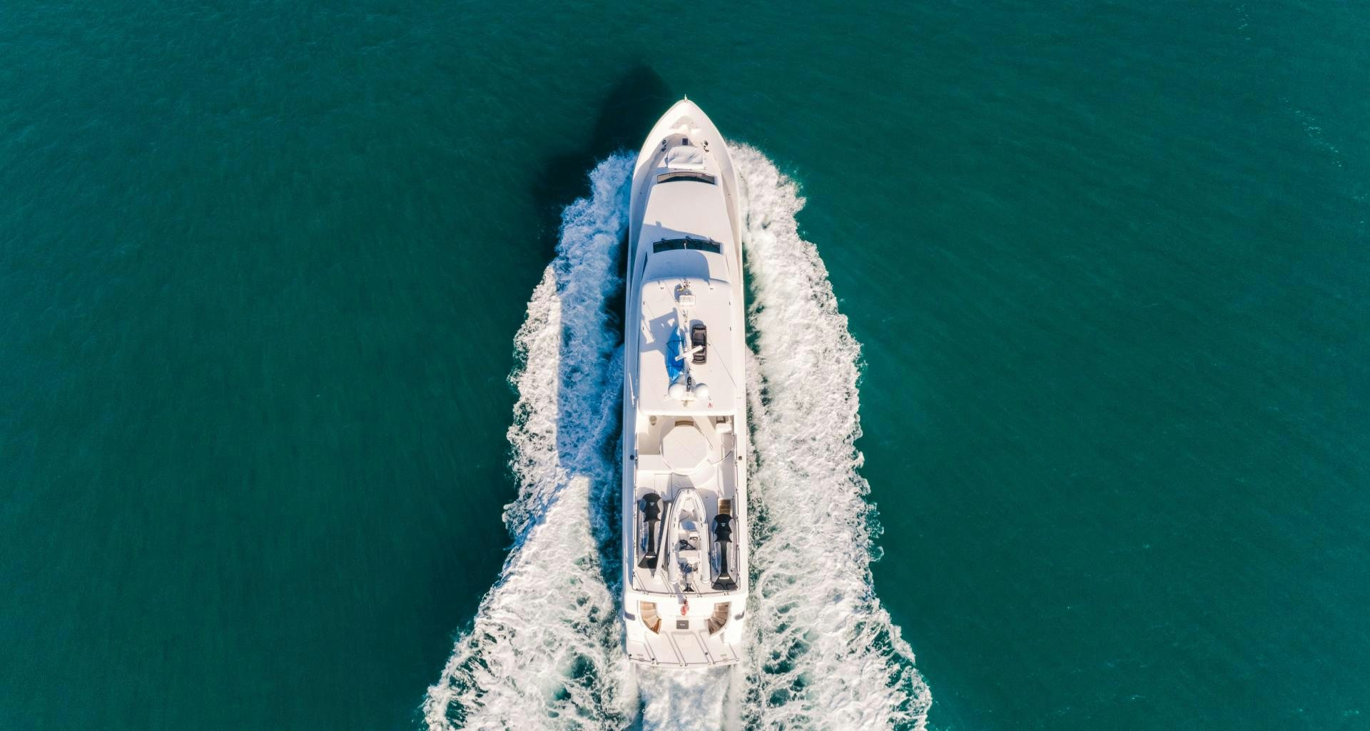 a white and black boat in the water aboard VITESSE Yacht for Sale