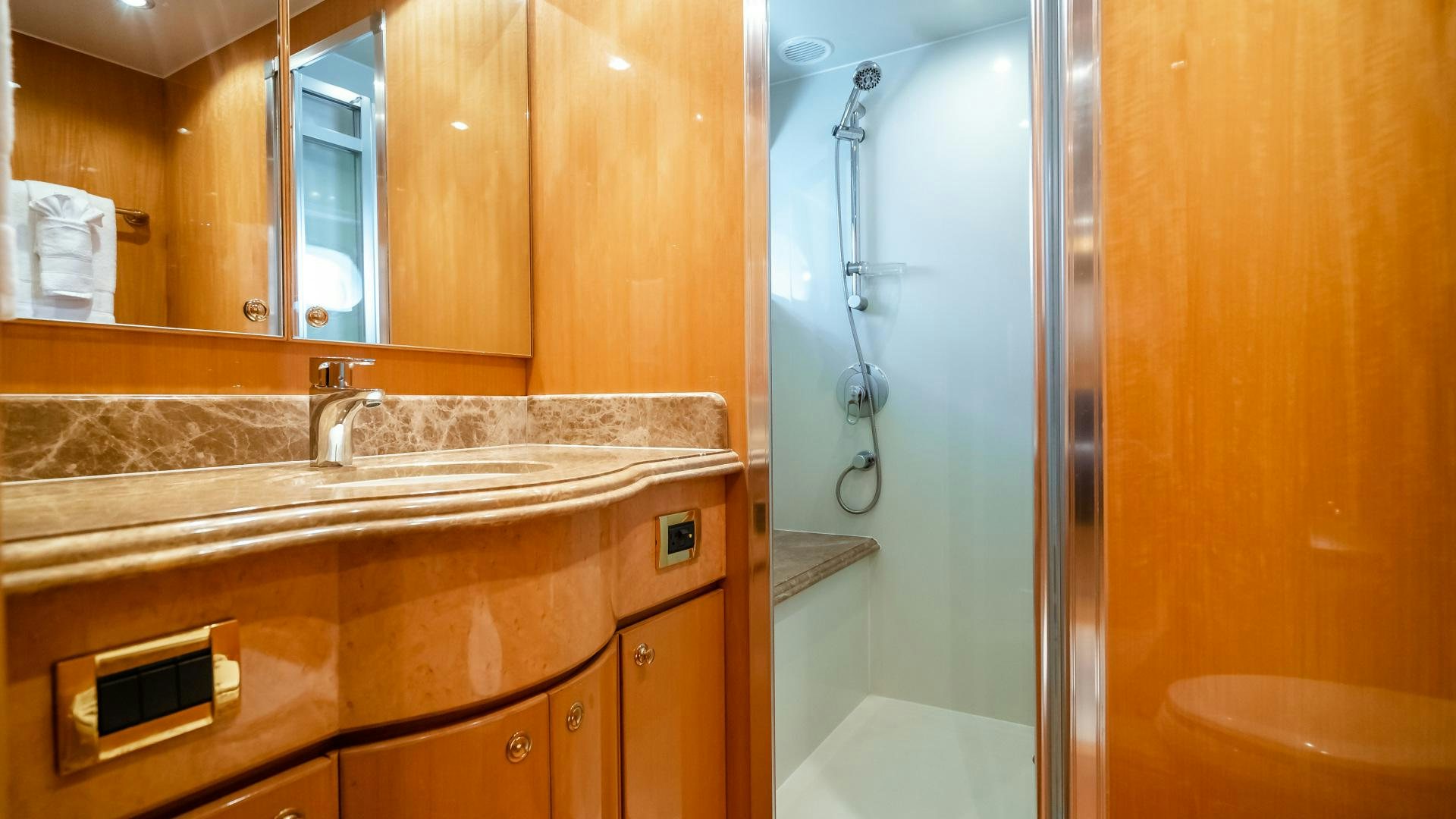 a bathroom with a large mirror aboard VITESSE Yacht for Sale