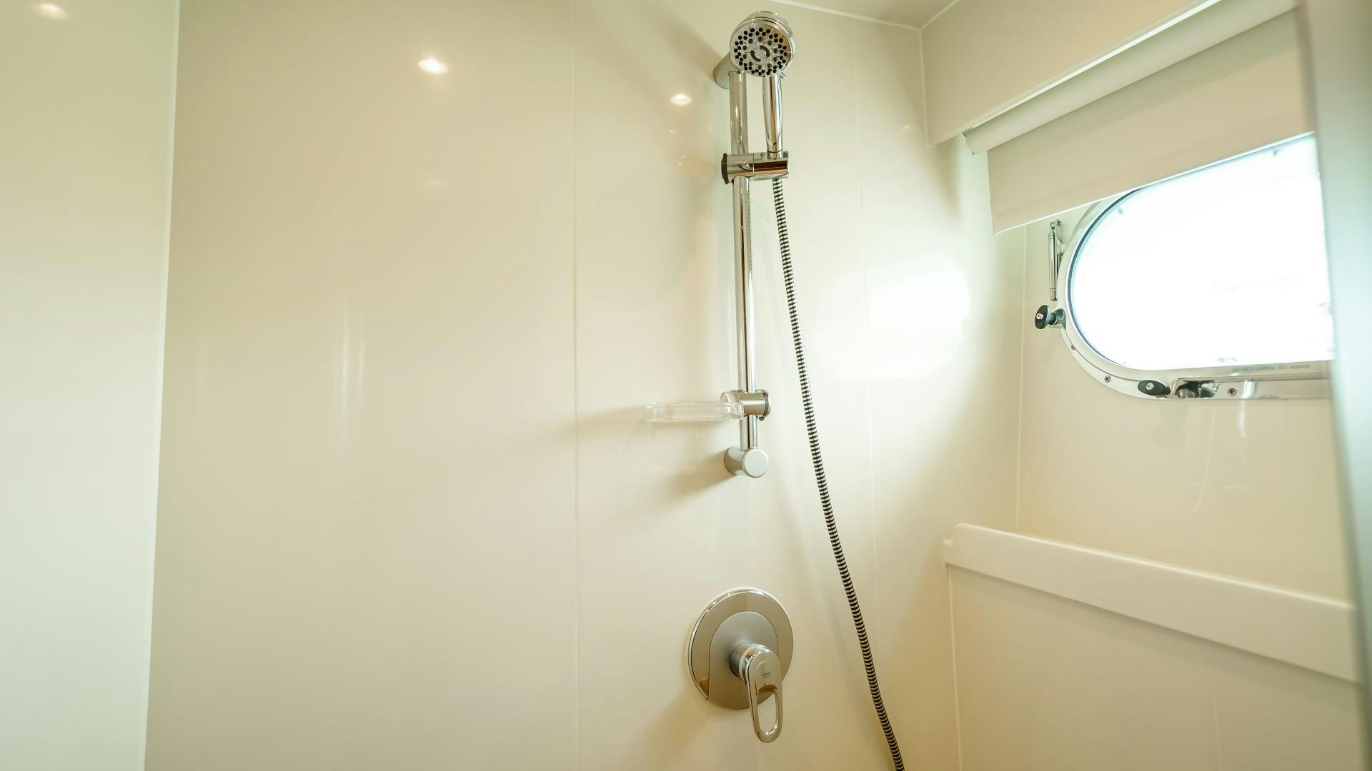 a shower with a glass door aboard VITESSE Yacht for Sale