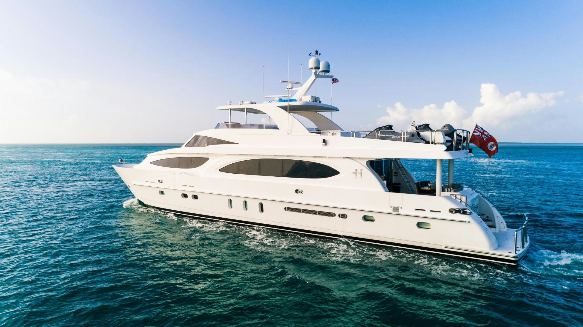 a white yacht in the water aboard VITESSE Yacht for Sale