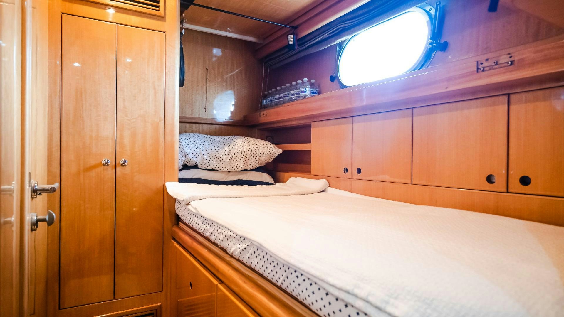 a room with two beds aboard VITESSE Yacht for Sale