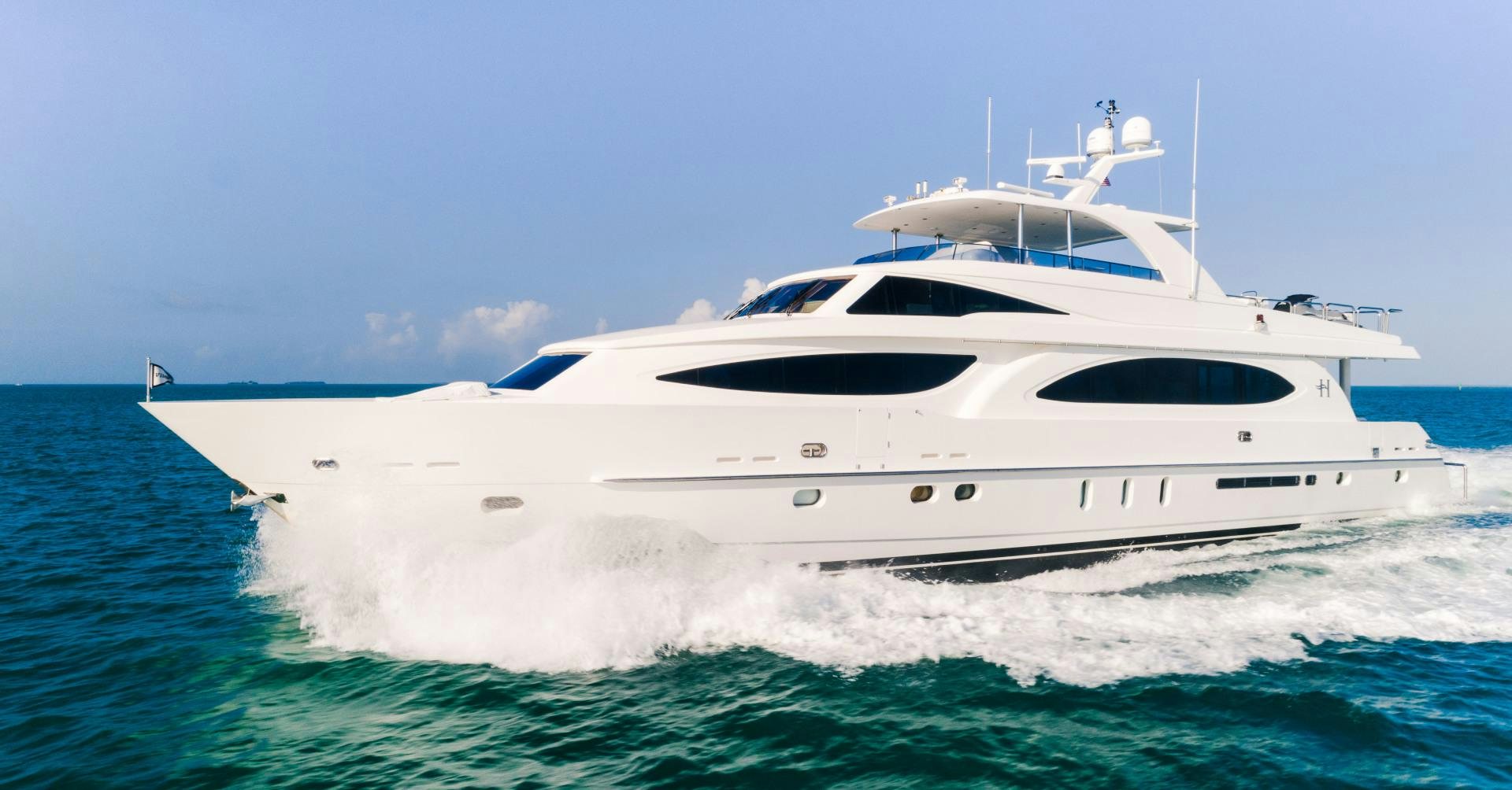 a white yacht in the water aboard VITESSE Yacht for Sale
