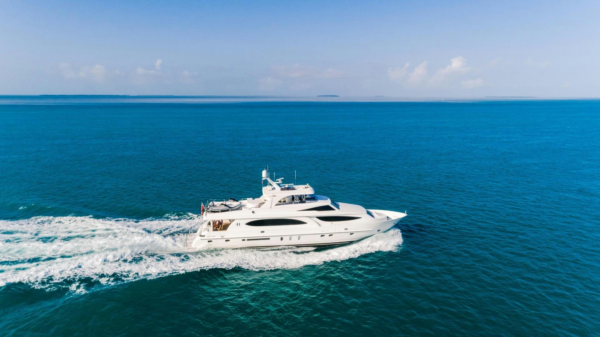 a white boat in the ocean aboard VITESSE Yacht for Sale