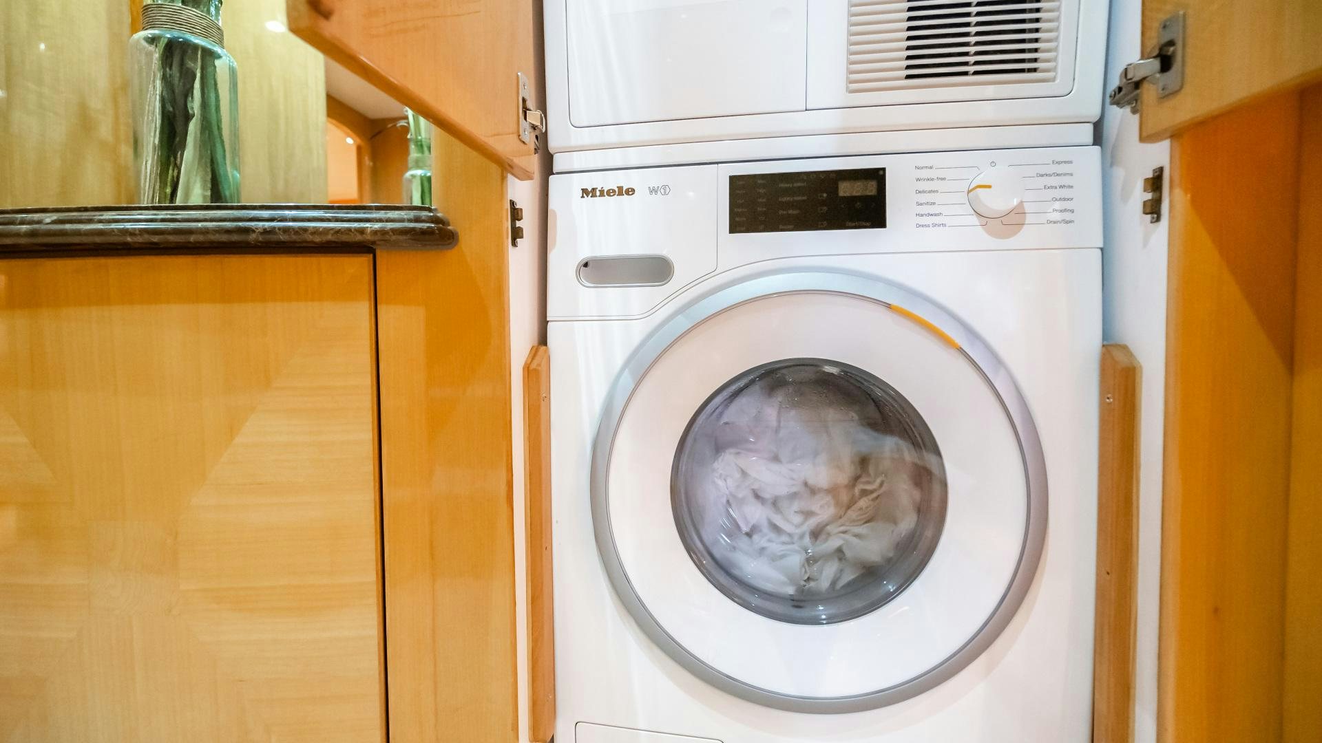 a white washing machine aboard VITESSE Yacht for Sale