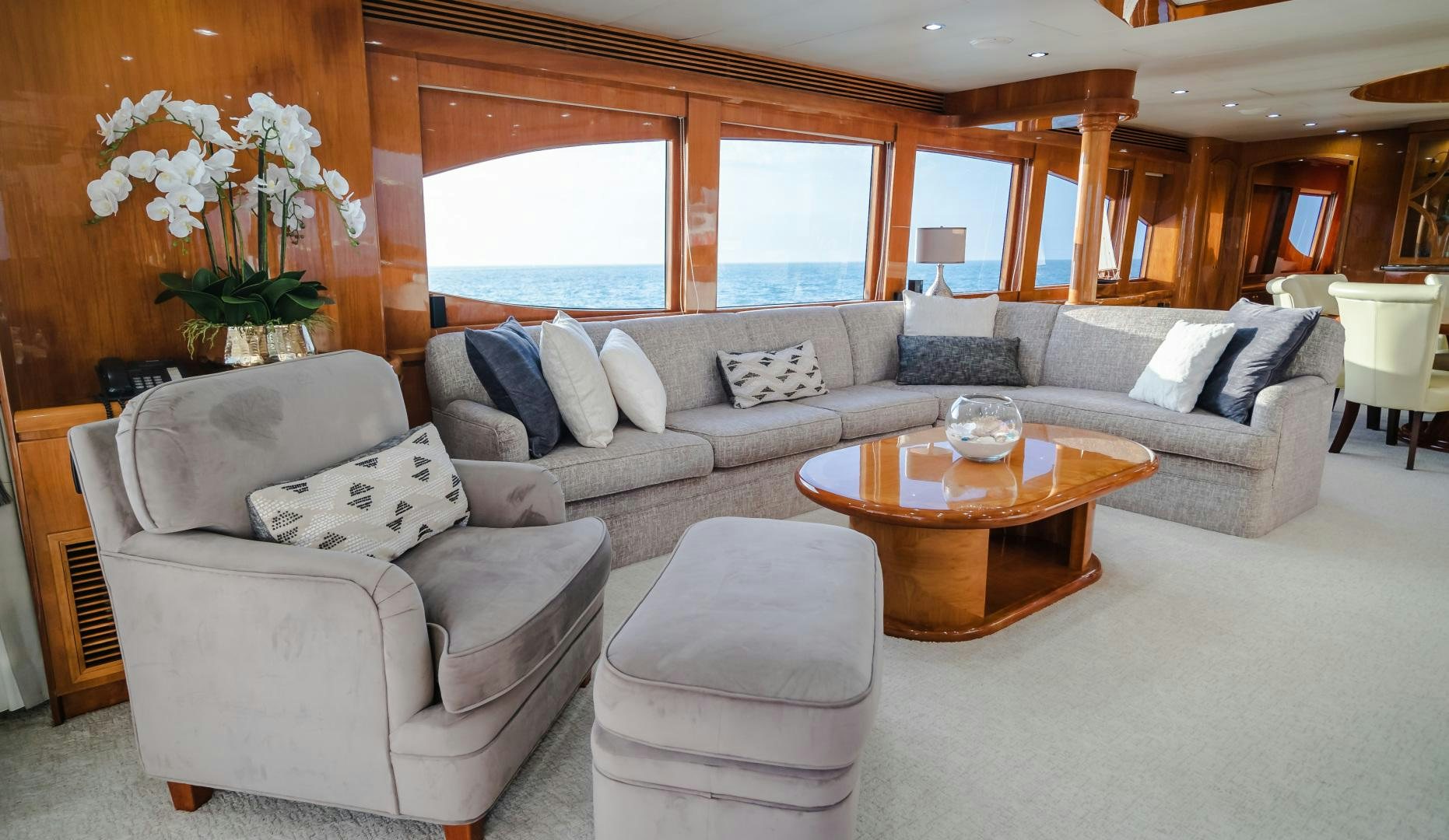 a living room with a couch and a coffee table aboard VITESSE Yacht for Sale