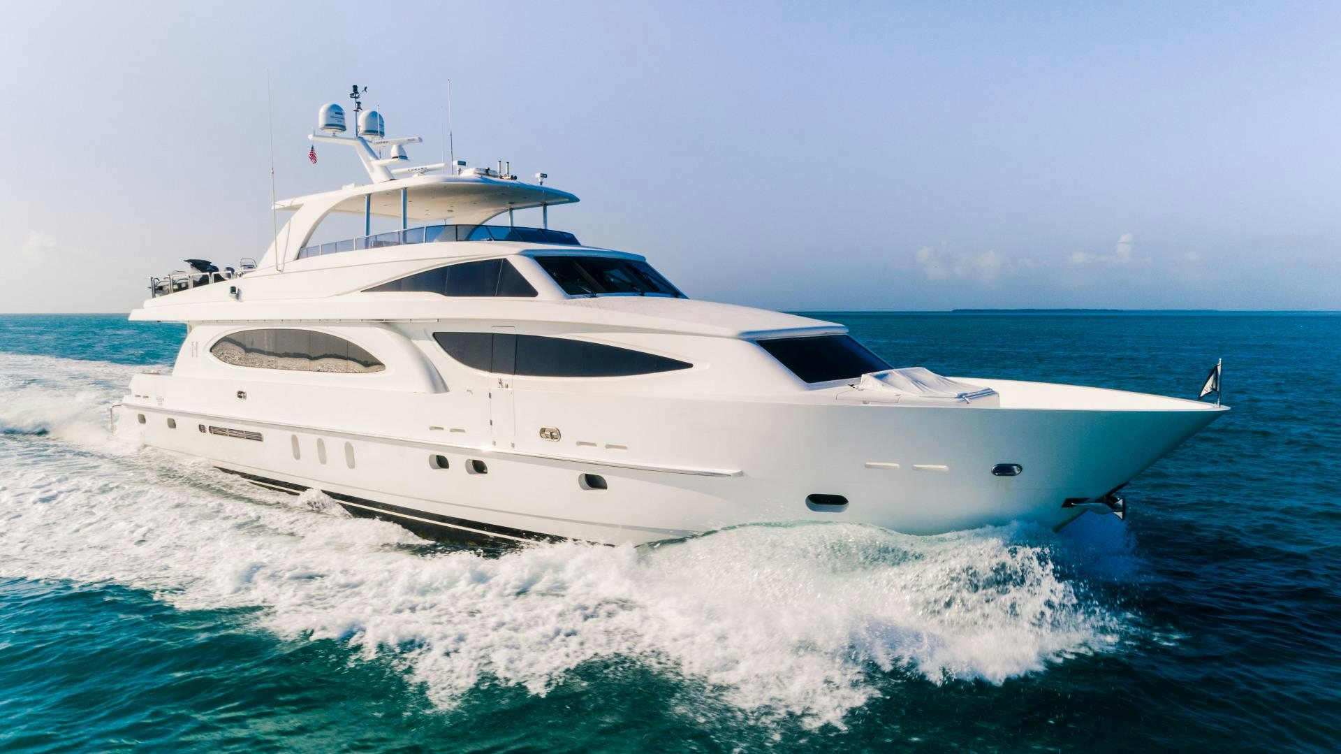 a white yacht on the water aboard VITESSE Yacht for Sale