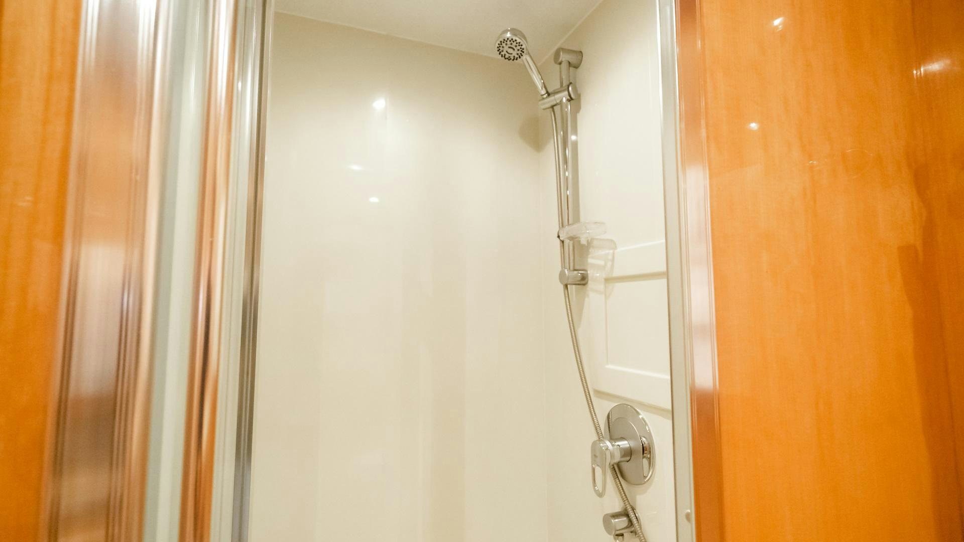 a white door with a handle aboard VITESSE Yacht for Sale