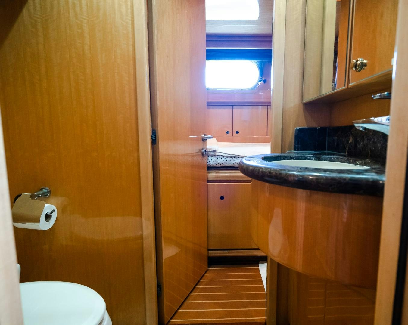 a bathroom with a sink and a toilet aboard VITESSE Yacht for Sale