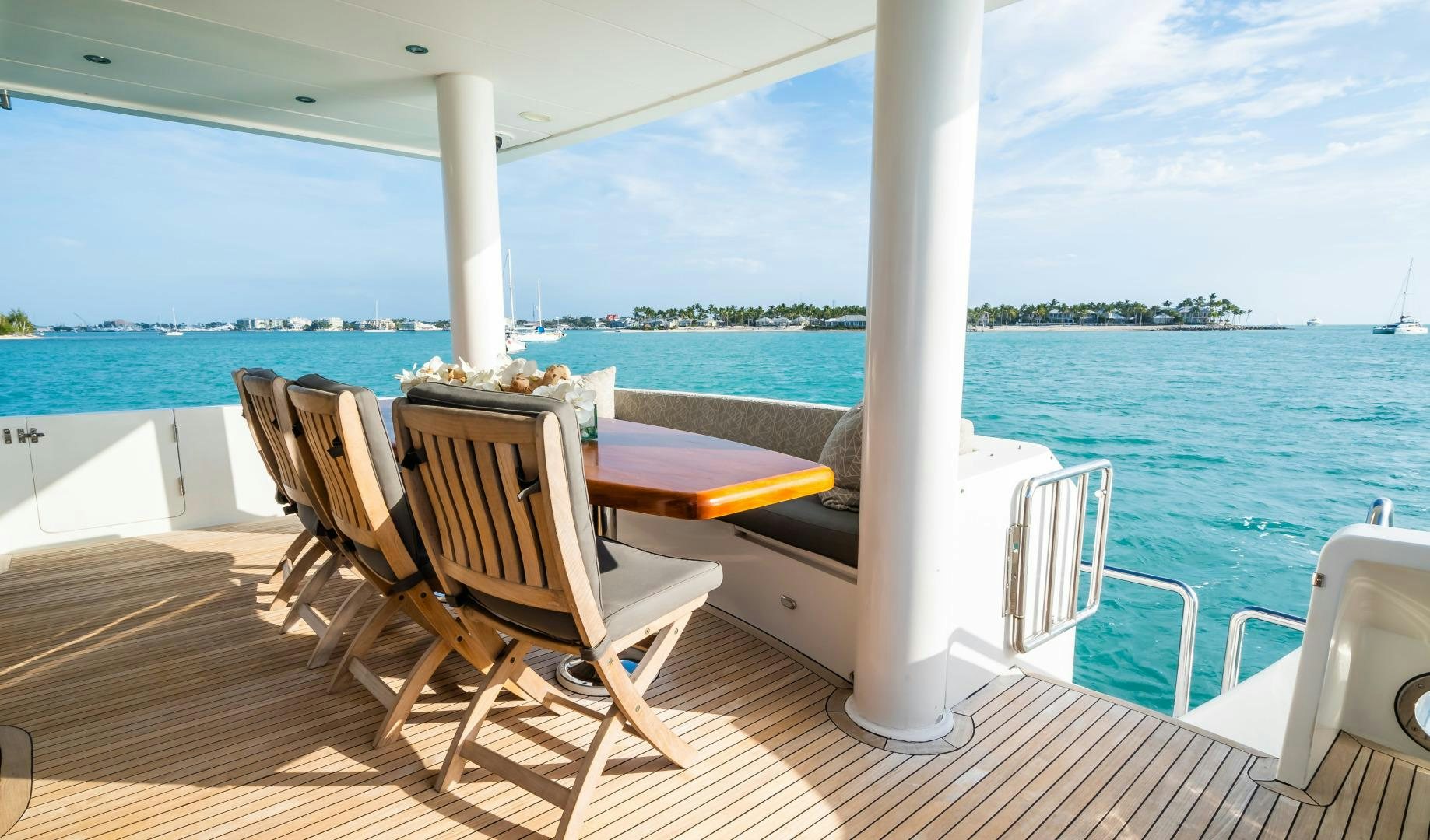a wooden table on a boat aboard VITESSE Yacht for Sale