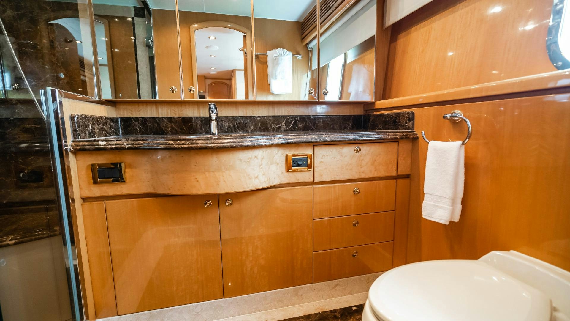 a bathroom with a sink and a toilet aboard VITESSE Yacht for Sale