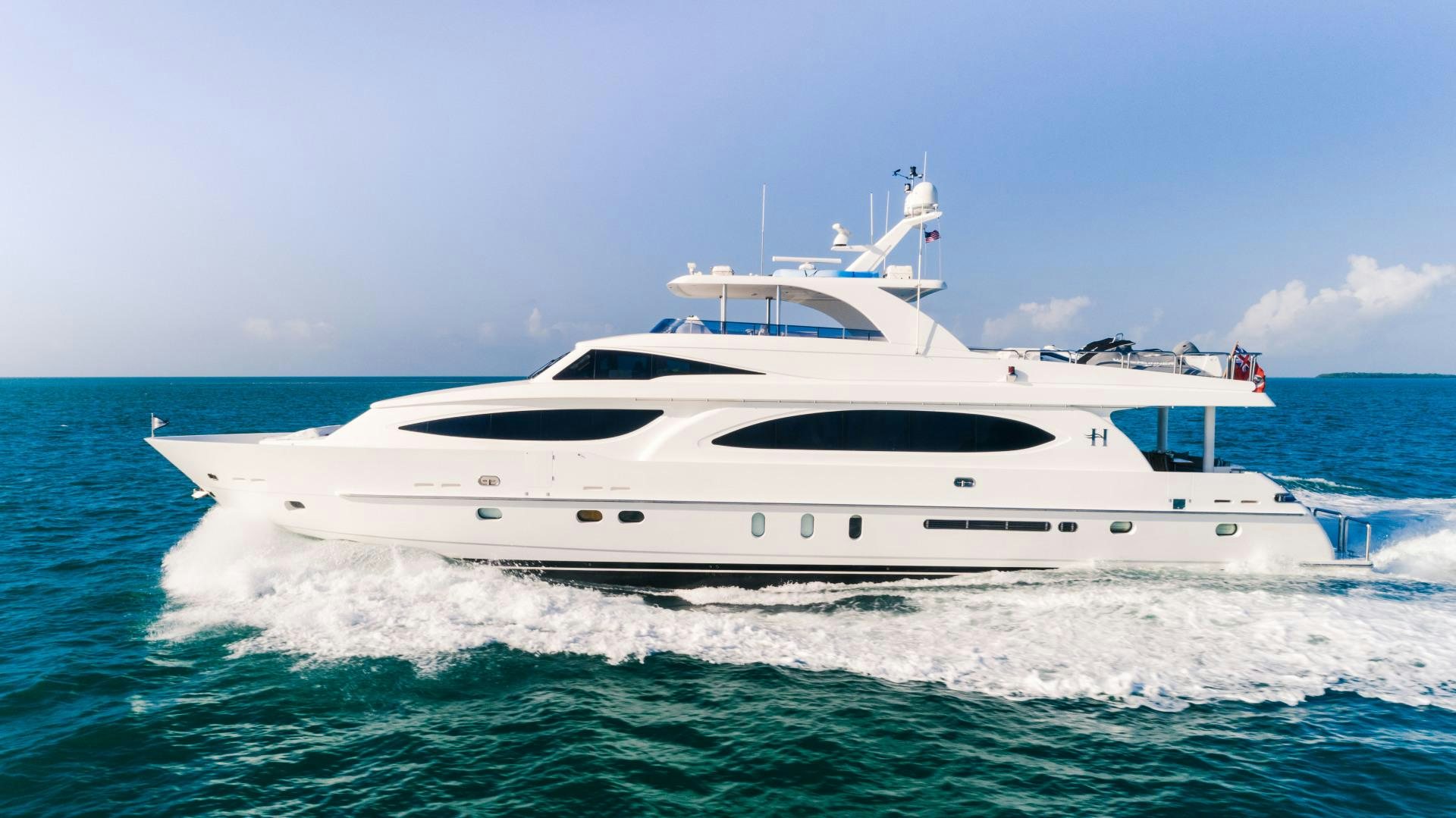 a white yacht in the water aboard VITESSE Yacht for Sale