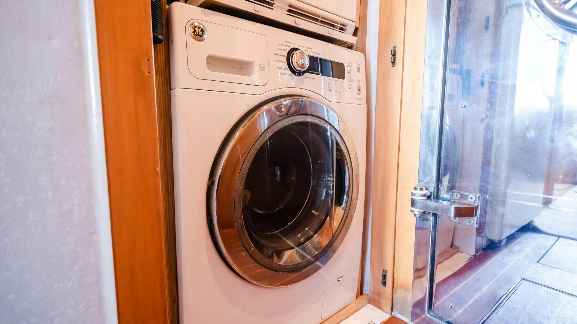 a washing machine in a room aboard VITESSE Yacht for Sale