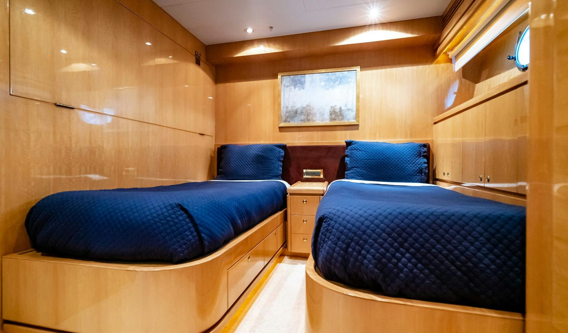 a room with two beds aboard VITESSE Yacht for Sale
