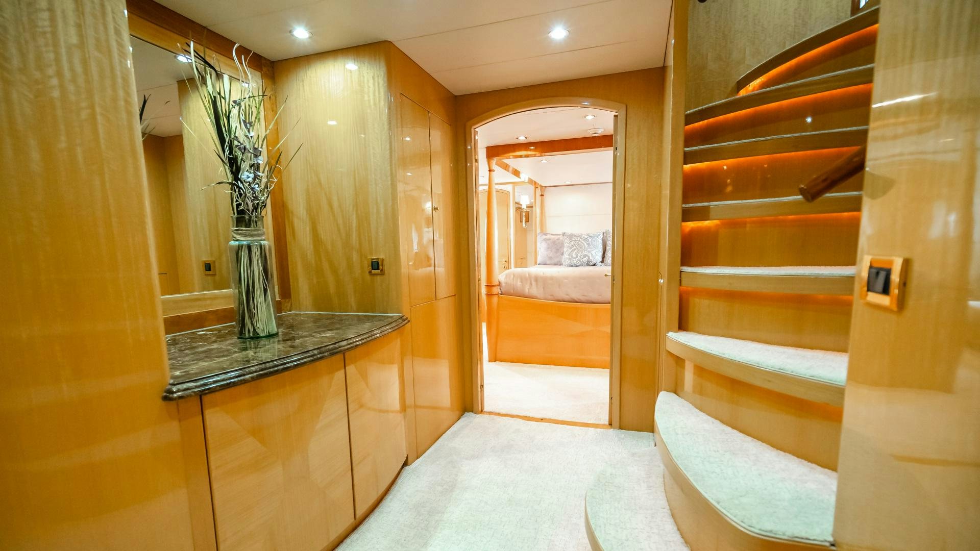 a room with a glass table and a glass door aboard VITESSE Yacht for Sale