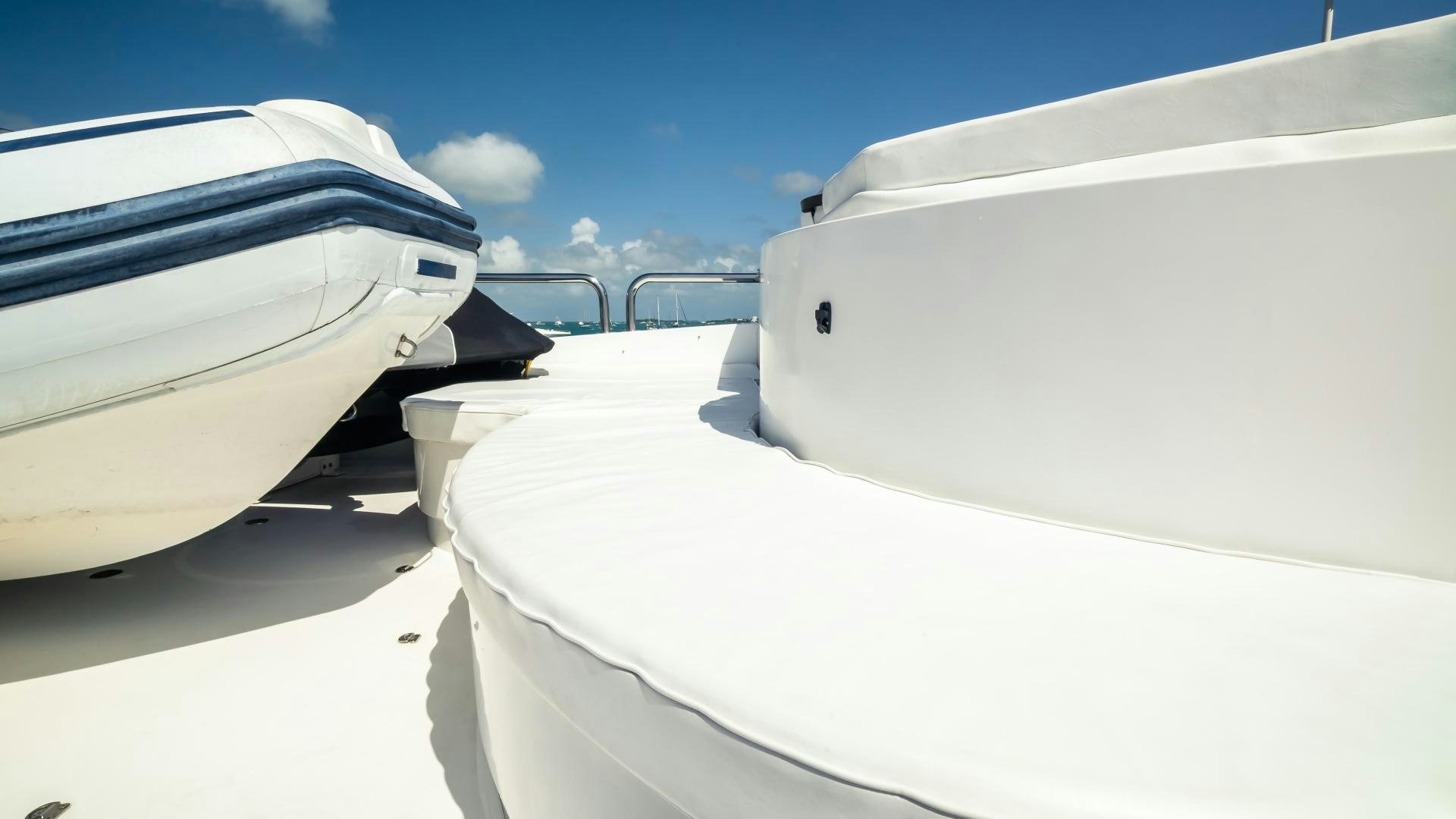 a row of white boats aboard VITESSE Yacht for Sale
