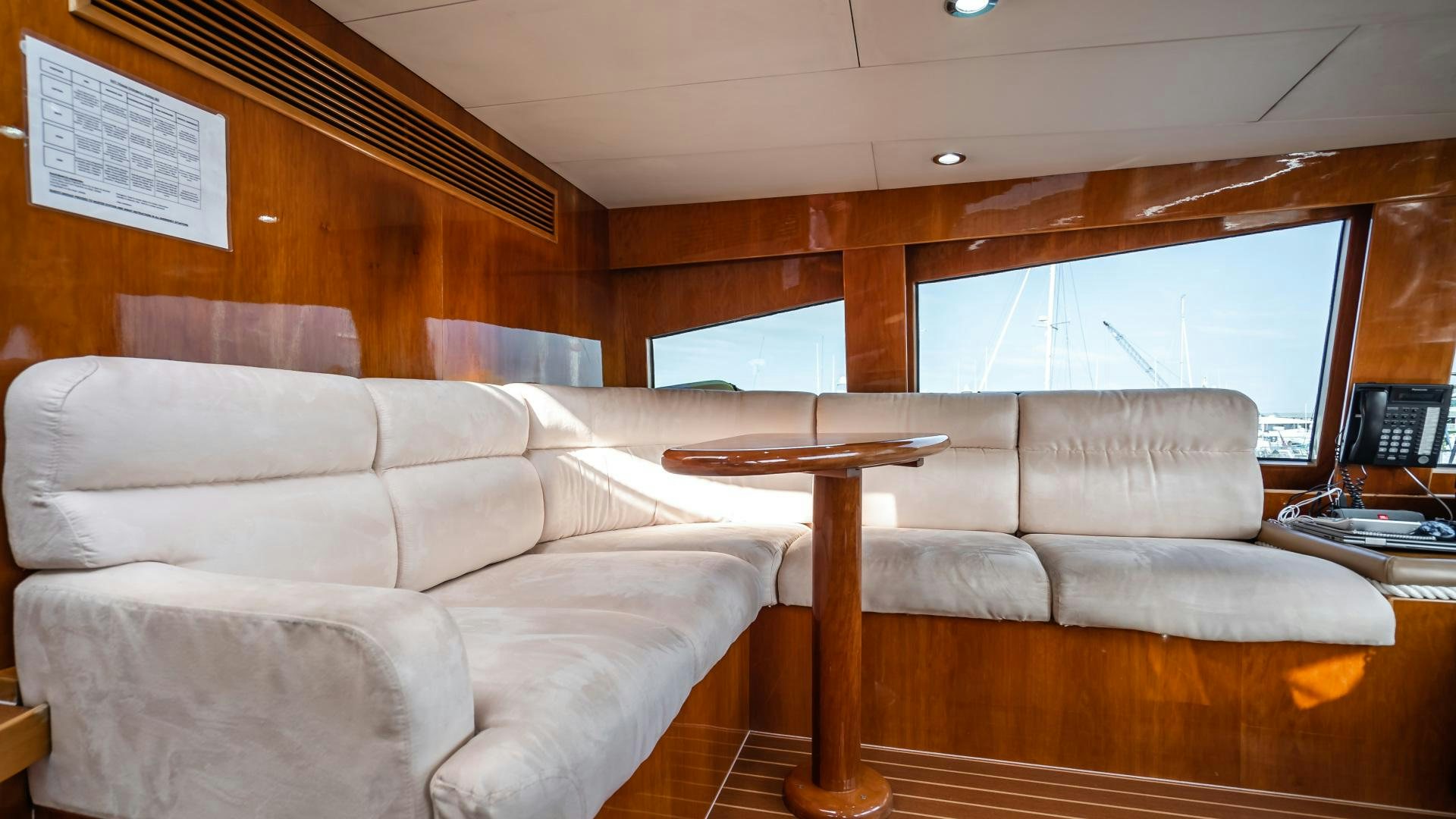 a living room with a couch and a table aboard VITESSE Yacht for Sale