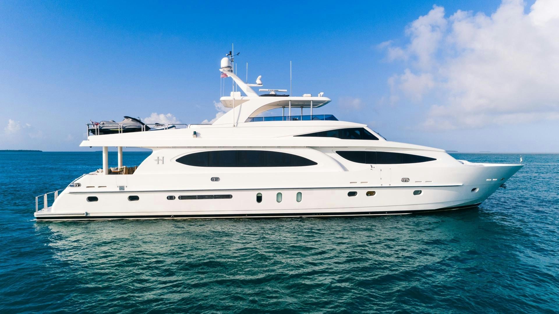 a white yacht in the water aboard VITESSE Yacht for Sale