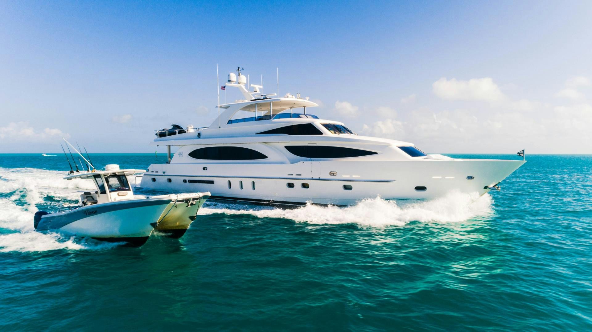 a white yacht on the water aboard VITESSE Yacht for Sale