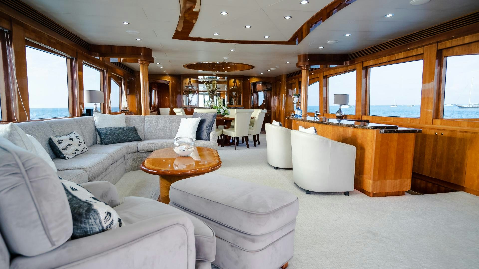 a living room with a couch and a table aboard VITESSE Yacht for Sale