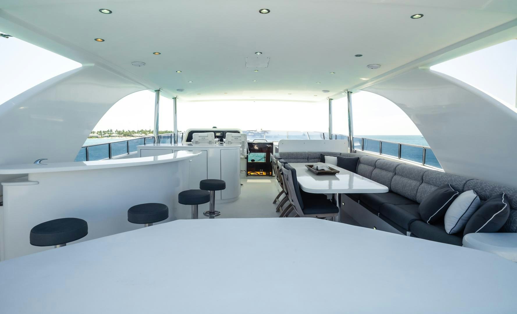 a room with a couch and a table aboard VITESSE Yacht for Sale