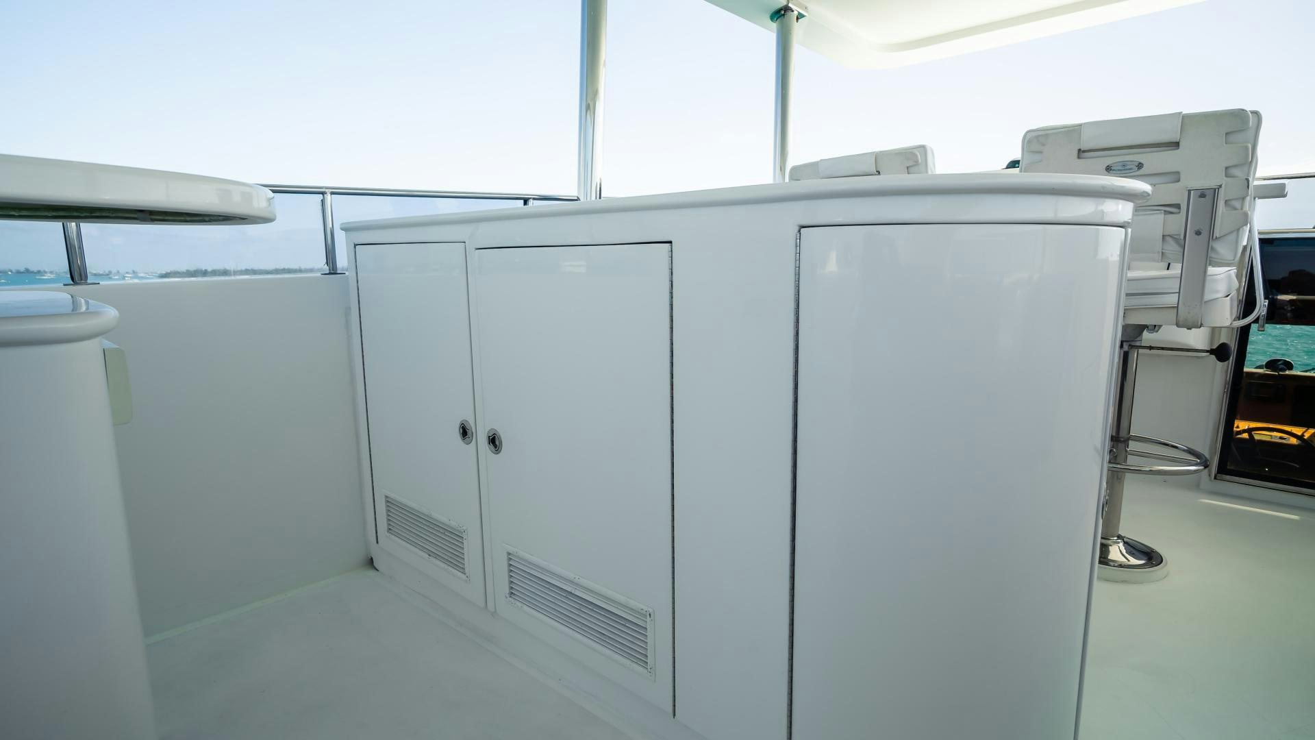 a room with white cabinets aboard VITESSE Yacht for Sale