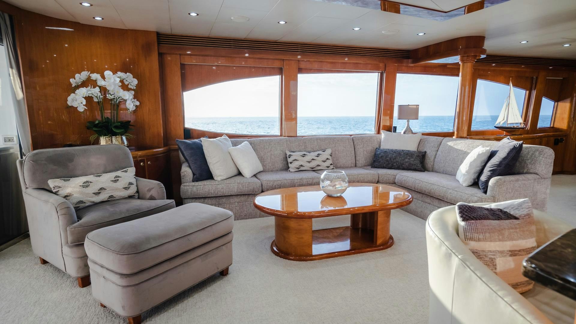 a living room with a couch and a coffee table aboard VITESSE Yacht for Sale