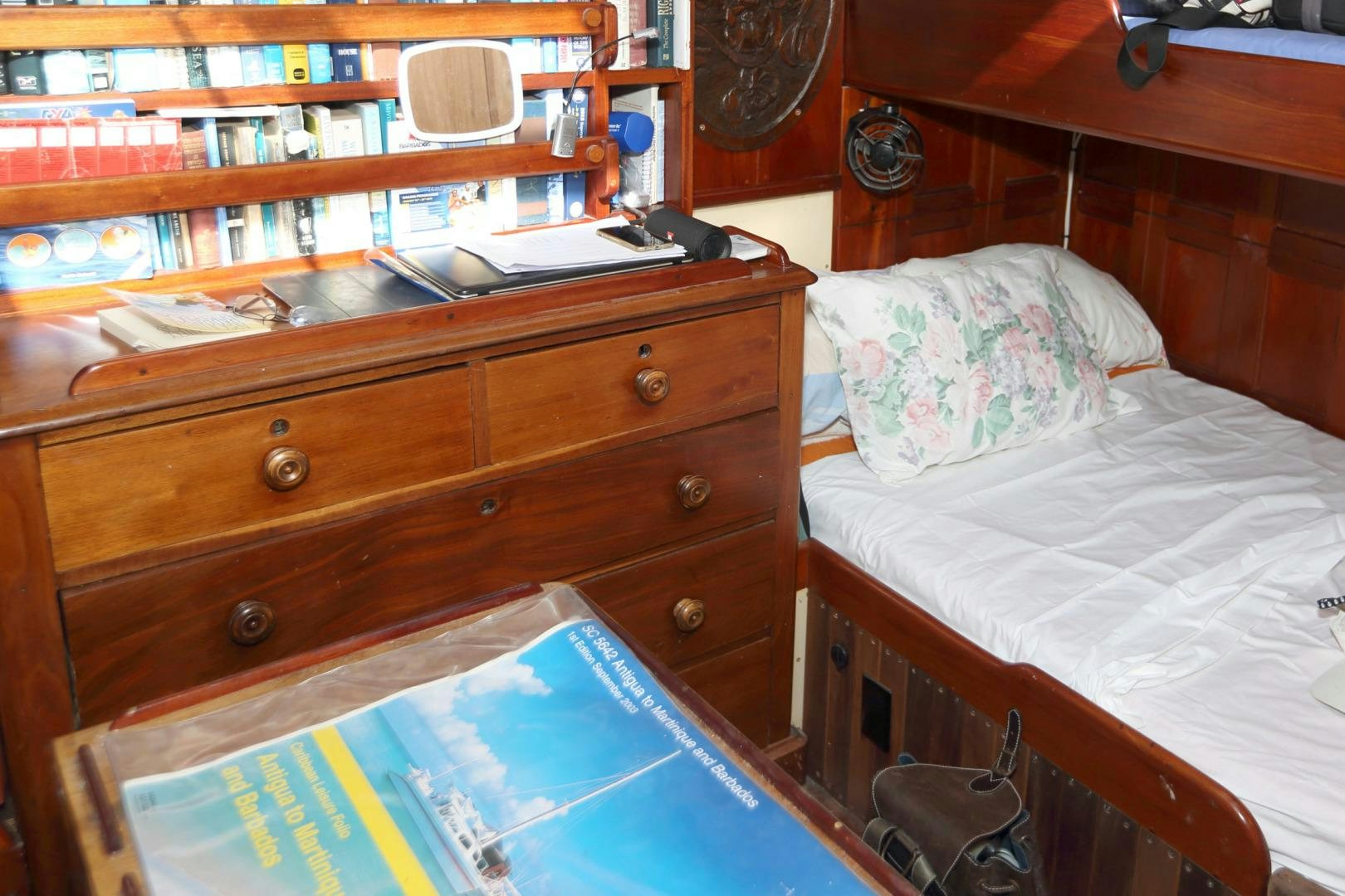 a dresser with a bed aboard SCHOONER RUTH Yacht for Sale