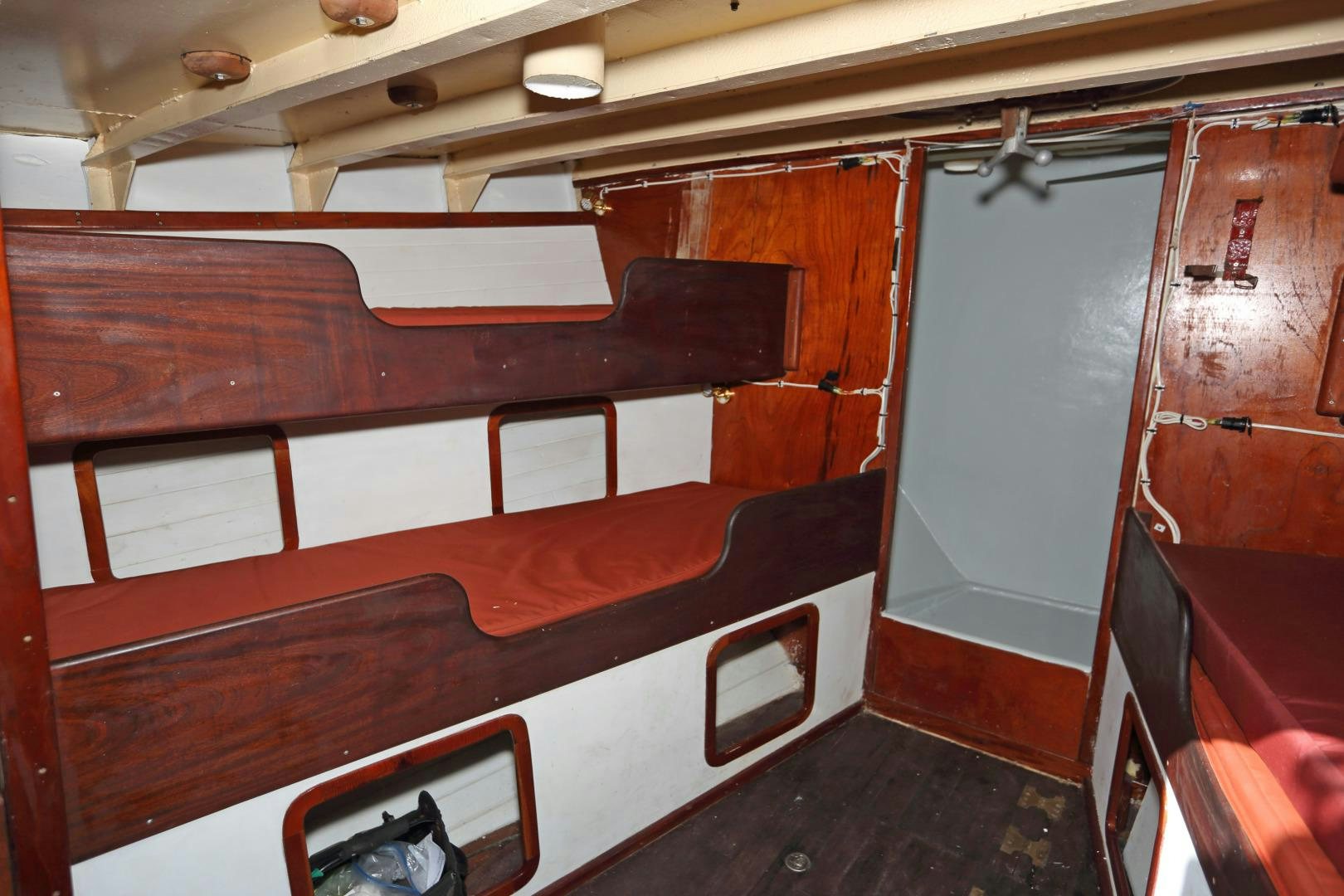 a room with a bench aboard SCHOONER RUTH Yacht for Sale
