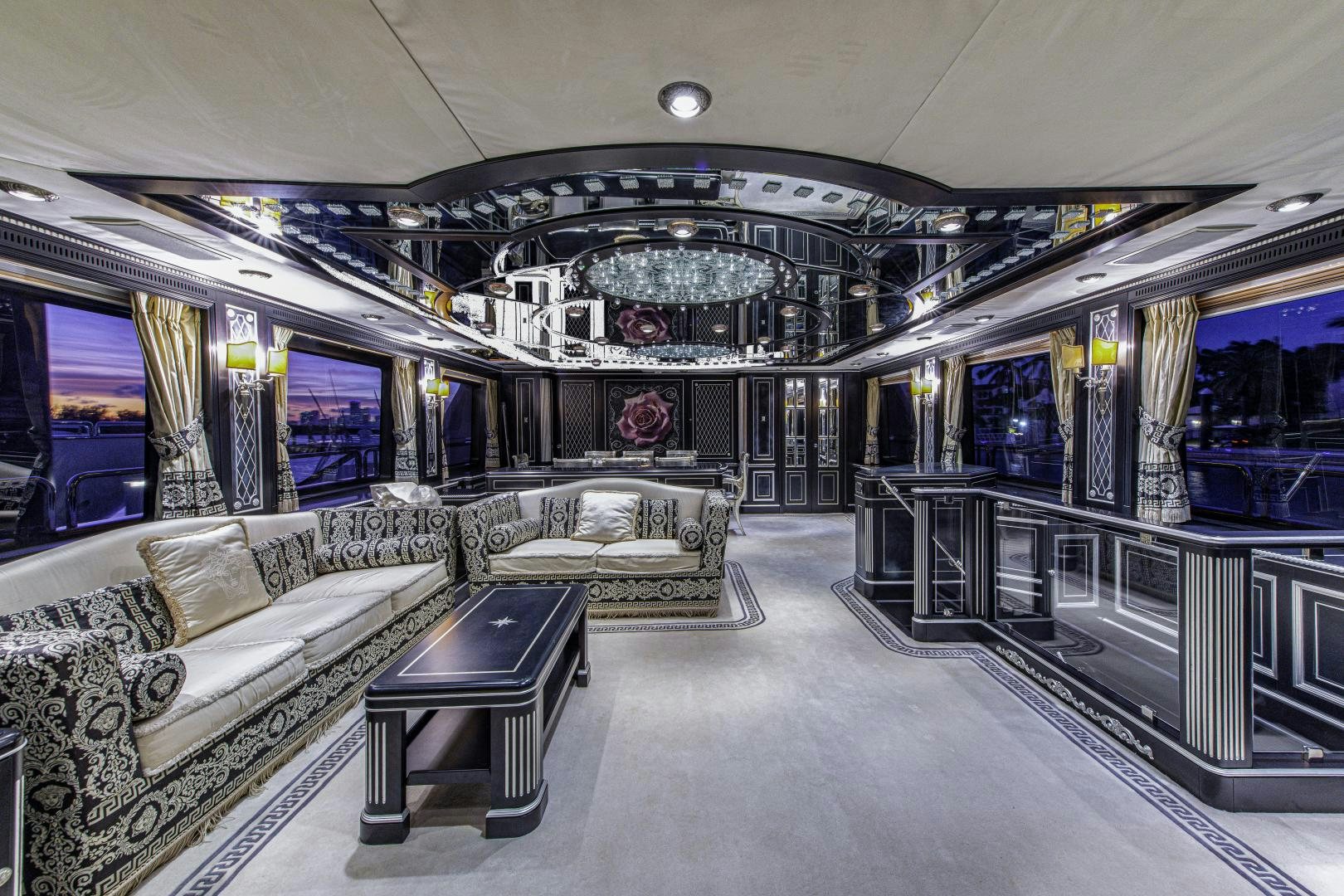 a room with couches and a table aboard RUTLI E Yacht for Sale