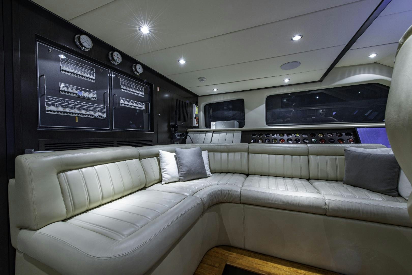 a white couch in a room aboard RUTLI E Yacht for Sale