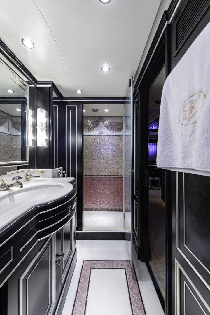a bathroom with a sink and a shower unit aboard RUTLI E Yacht for Sale