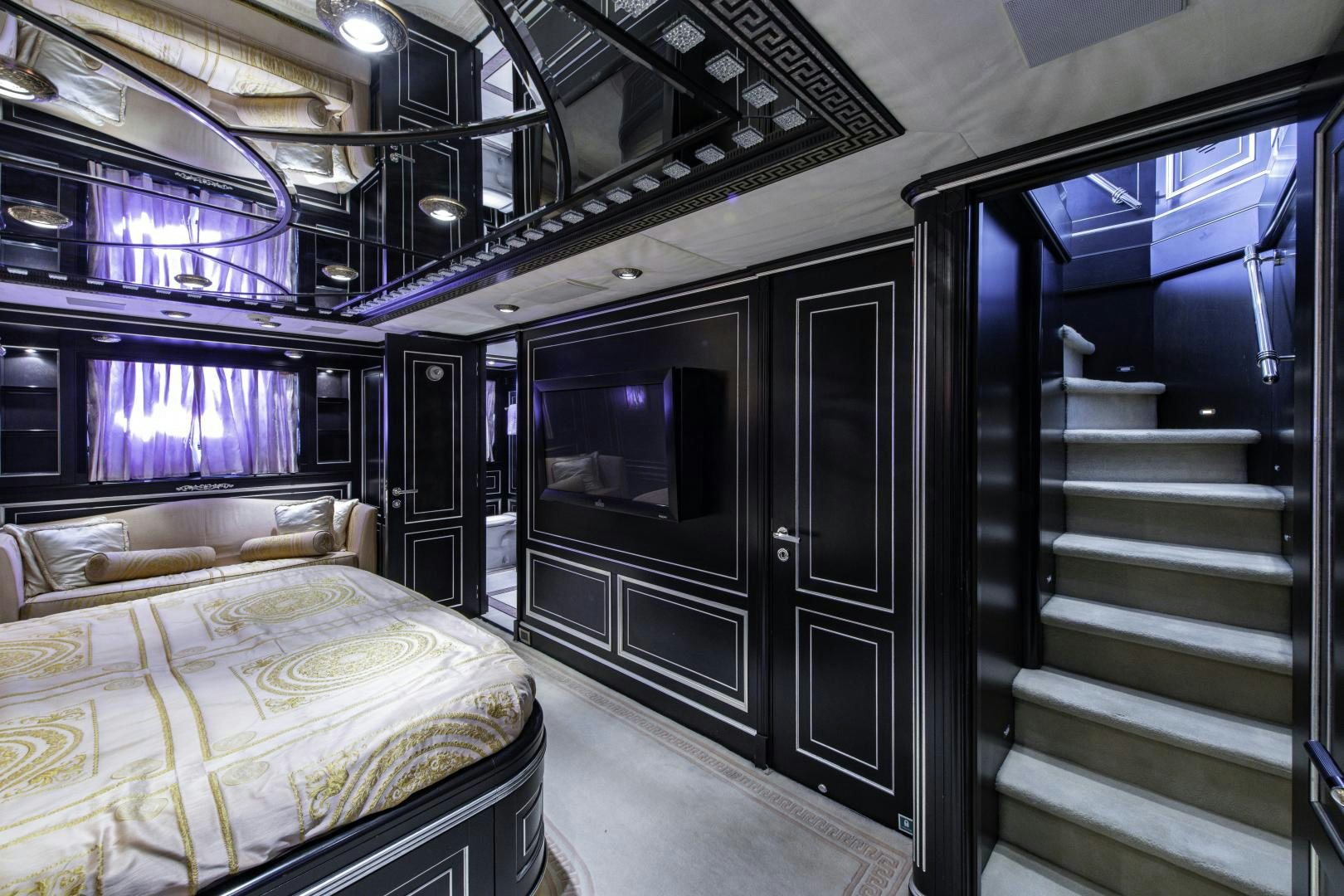 a room with a bed and a tv aboard RUTLI E Yacht for Sale