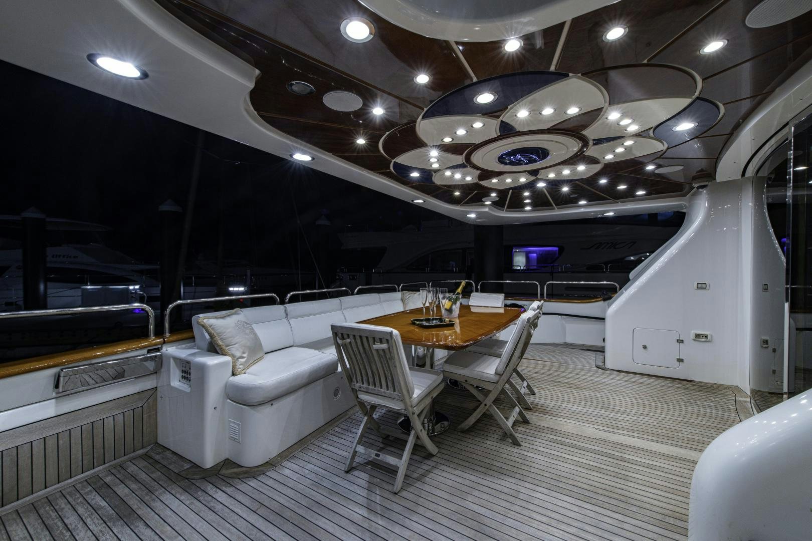 a room with a couch and a table and chairs aboard RUTLI E Yacht for Sale