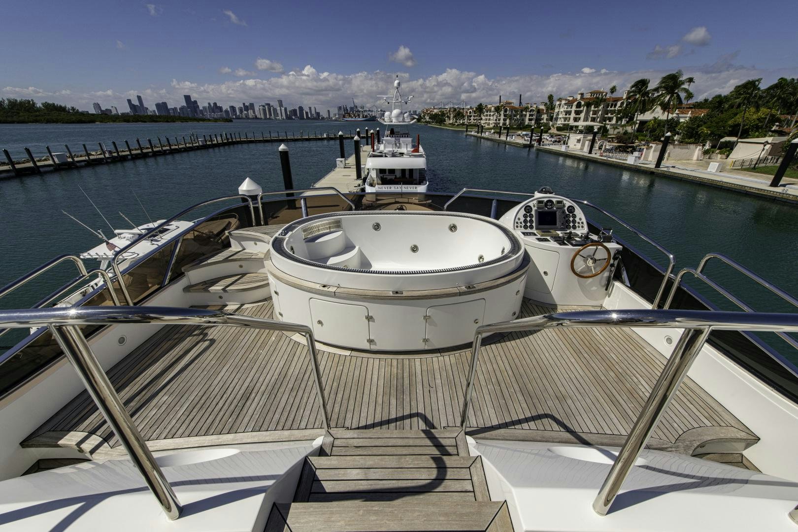 a group of boats sit in a harbor aboard RUTLI E Yacht for Sale