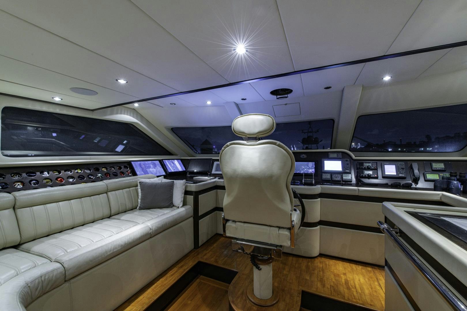 a room with a couch and a table aboard RUTLI E Yacht for Sale