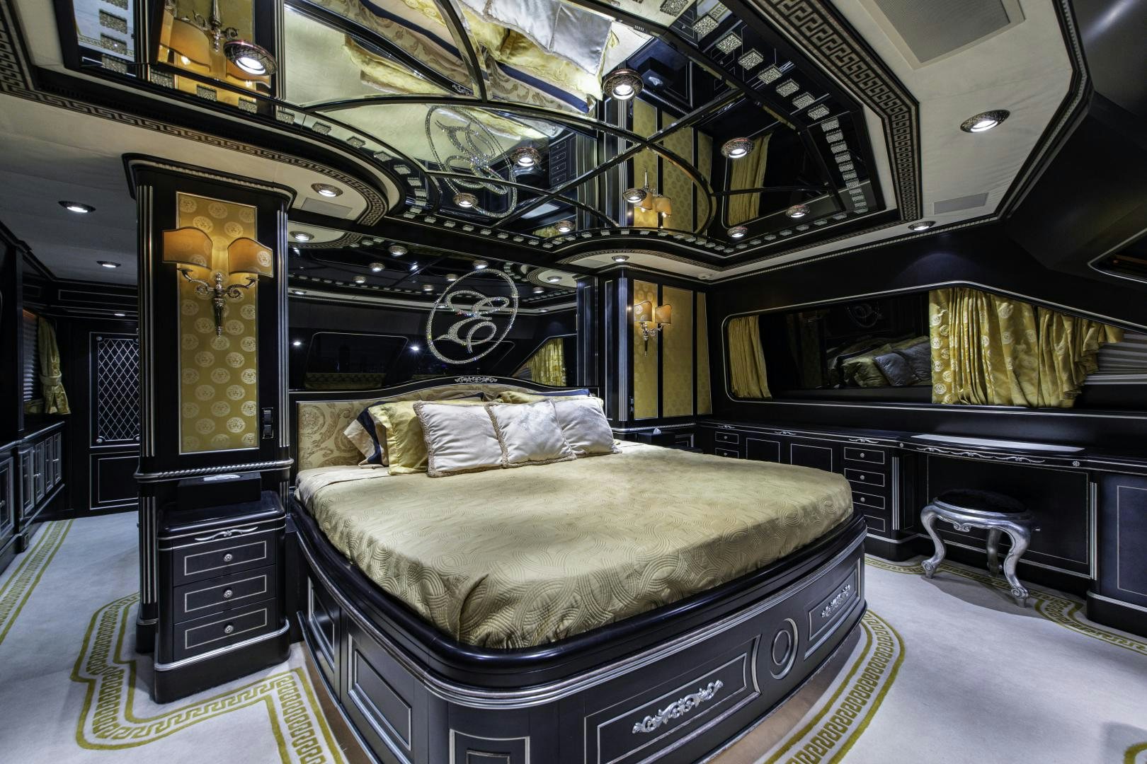 a large bed in a room aboard RUTLI E Yacht for Sale