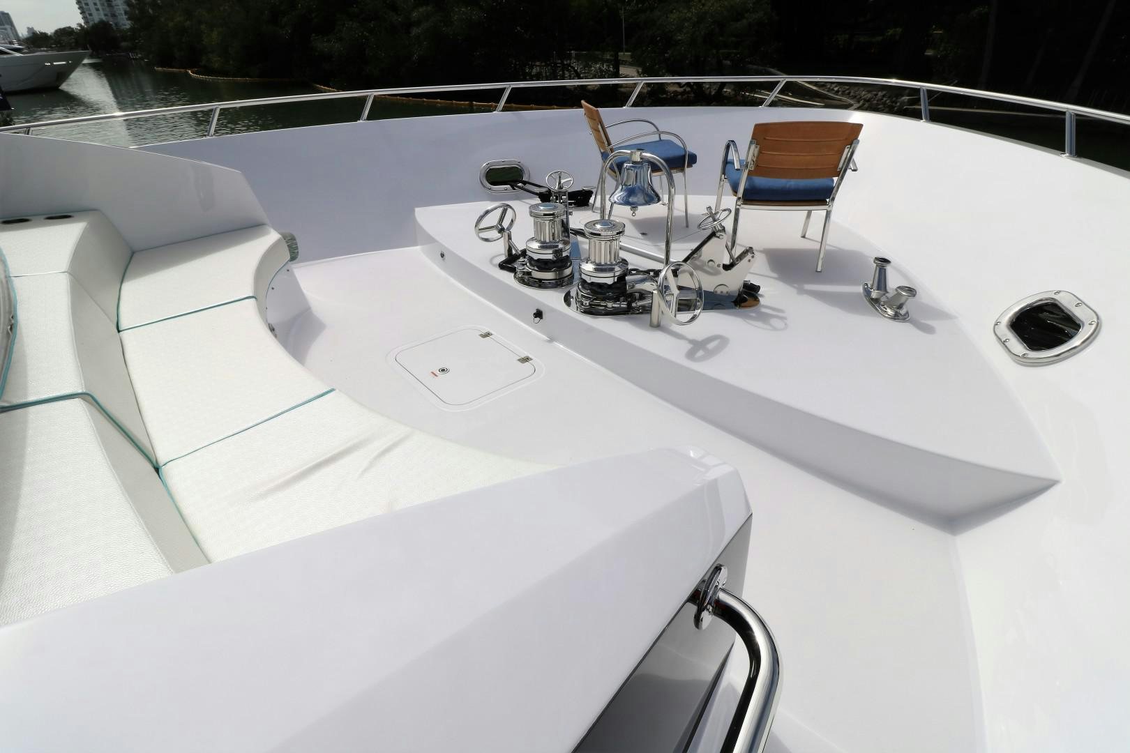 a white rectangular table with chairs on it aboard LADY CARMEN Yacht for Sale