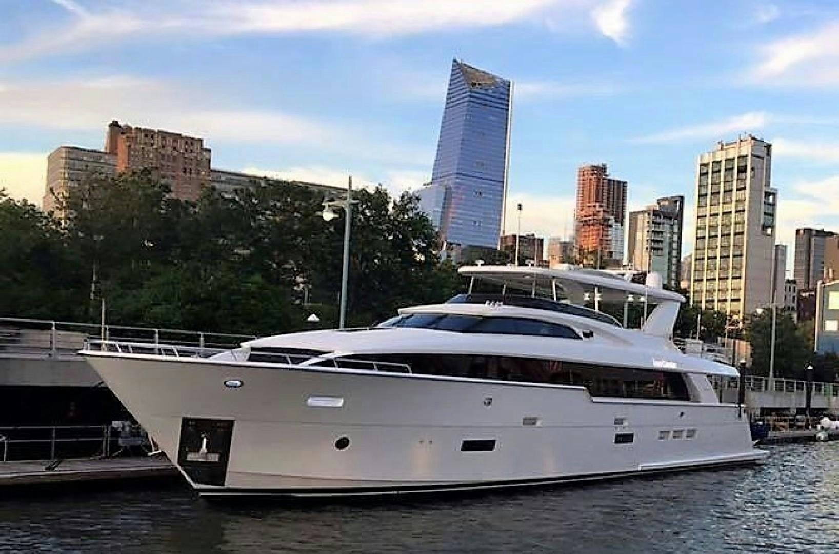 a white boat in a harbor aboard LADY CARMEN Yacht for Sale