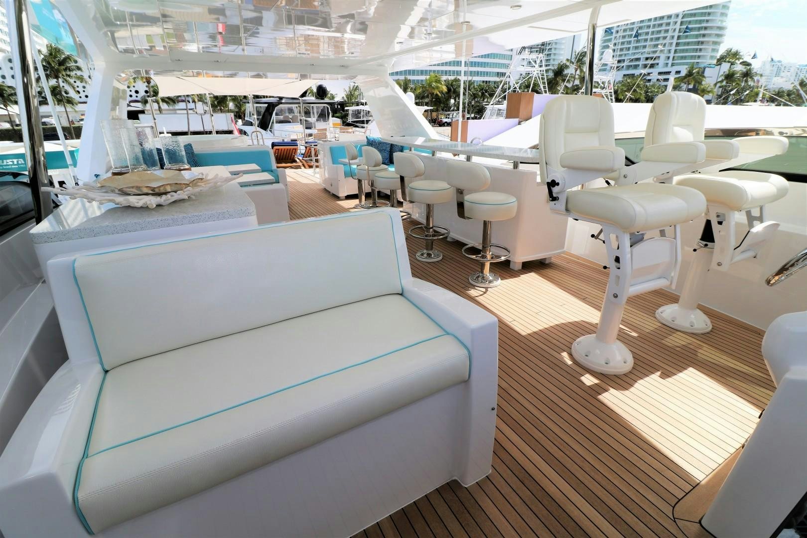 a room with a couch and chairs aboard LADY CARMEN Yacht for Sale