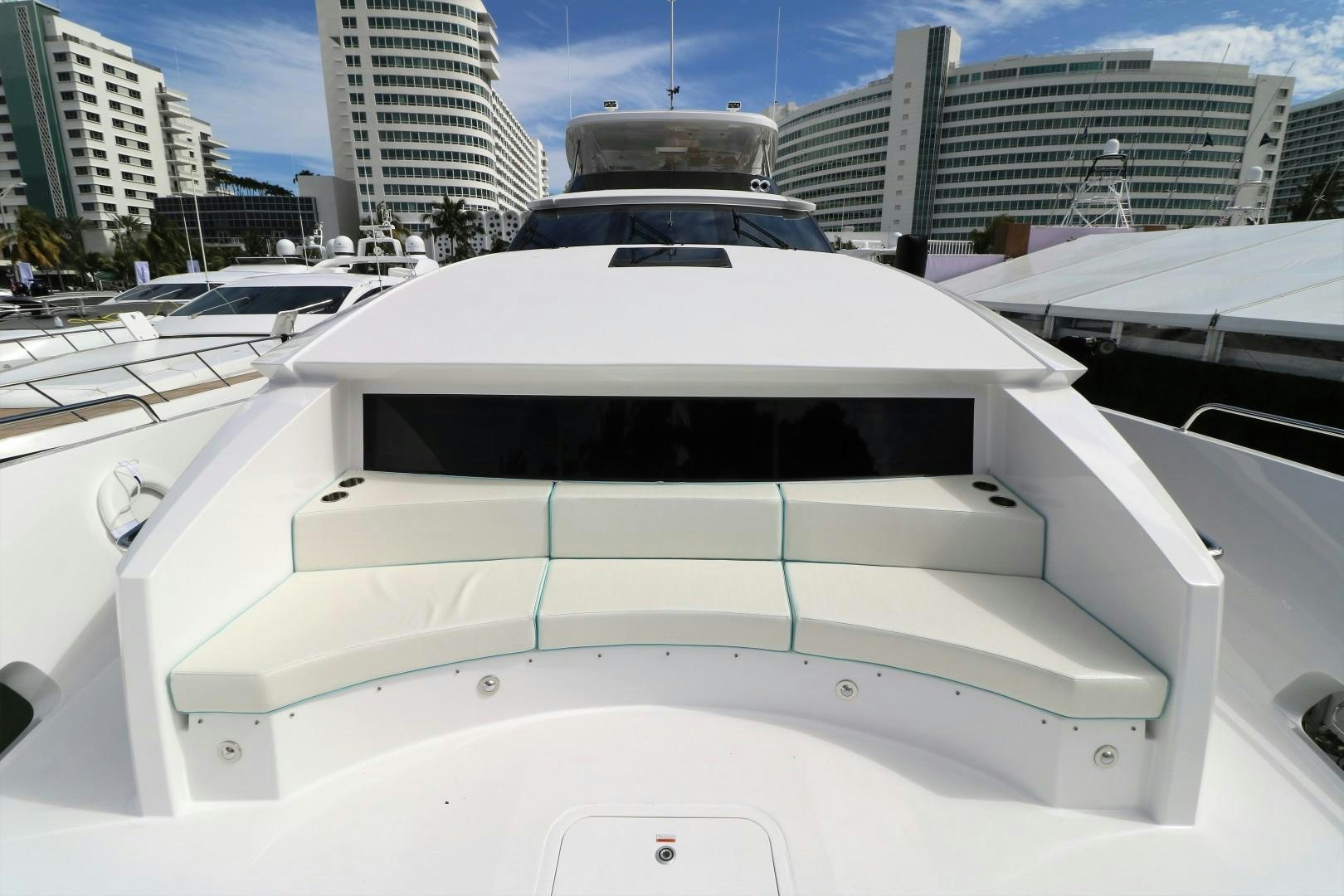 a white car parked in a parking lot aboard LADY CARMEN Yacht for Sale
