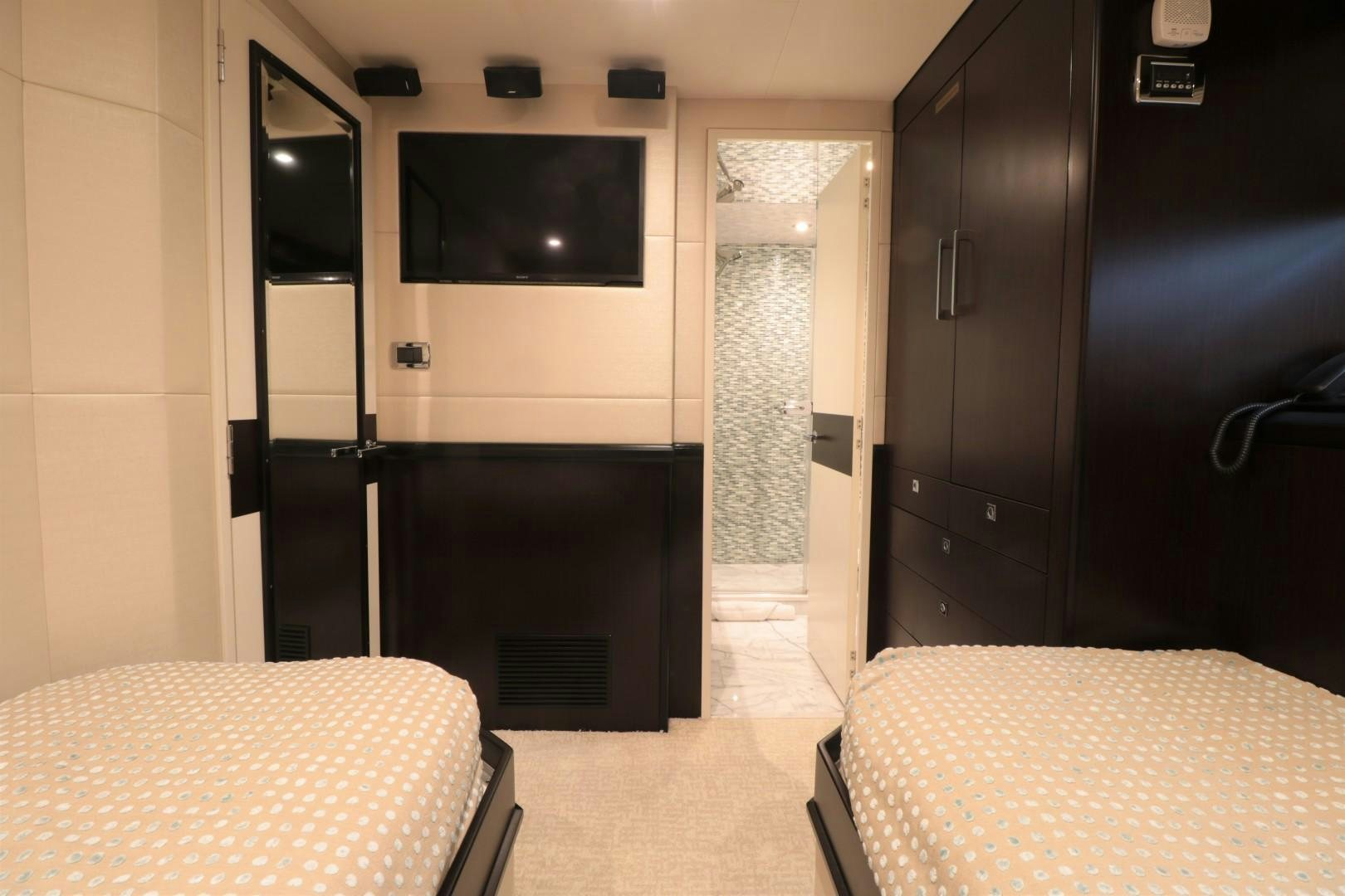 a room with a bed and a tv aboard LADY CARMEN Yacht for Sale