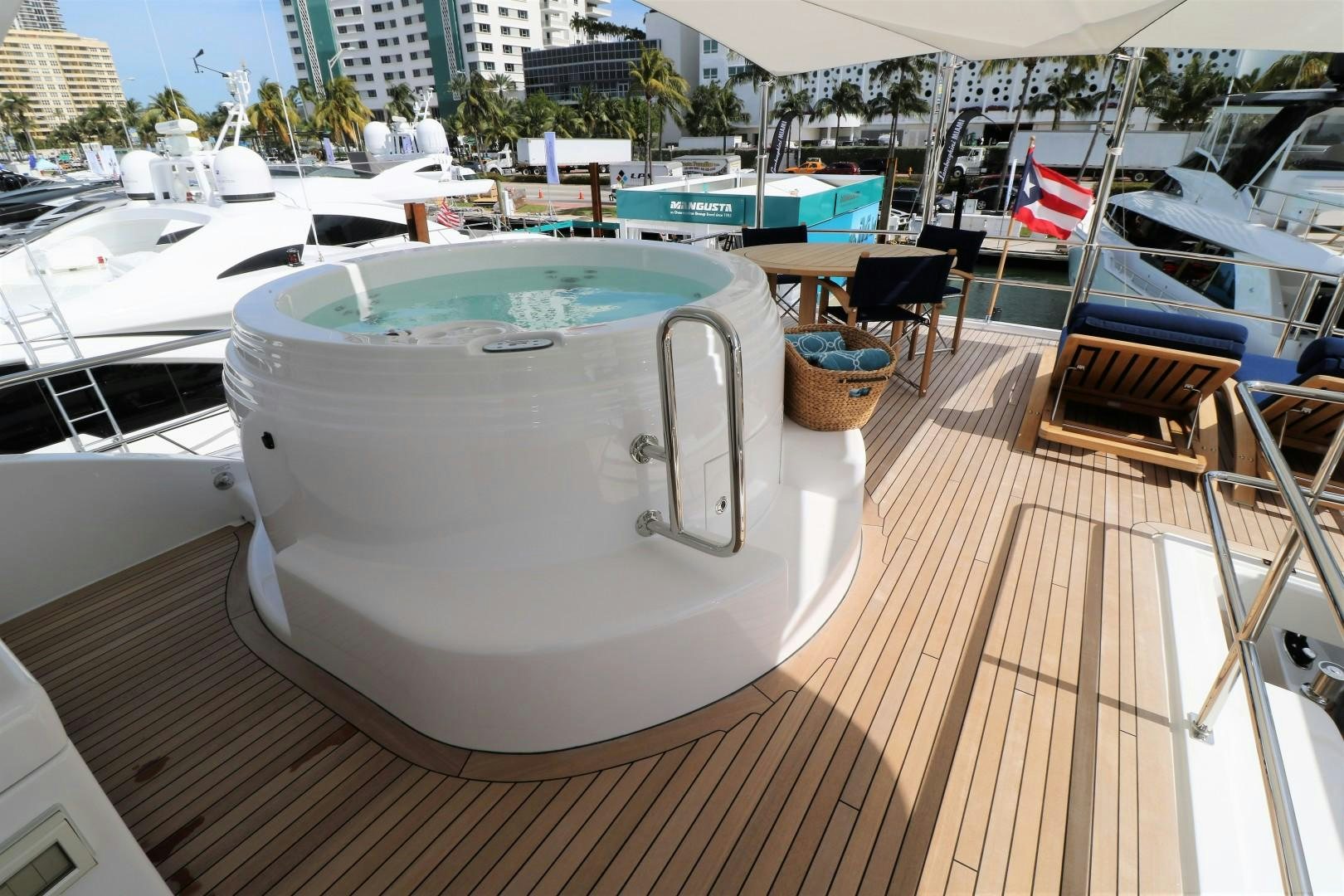 a white round object on a deck aboard LADY CARMEN Yacht for Sale