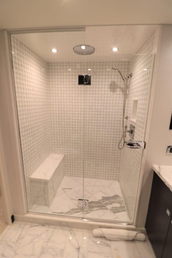 a bathroom with a shower and a sink aboard LADY CARMEN Yacht for Sale