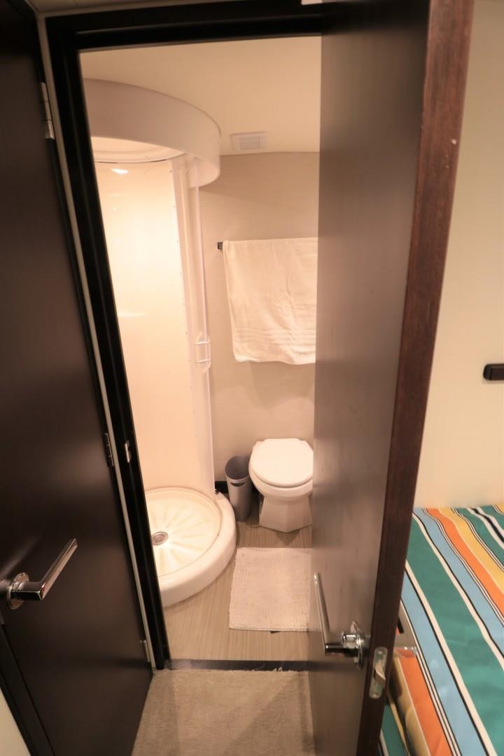 a bathroom with a toilet and a sink aboard LADY CARMEN Yacht for Sale