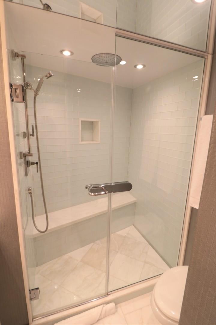 a shower with a glass door aboard LADY CARMEN Yacht for Sale
